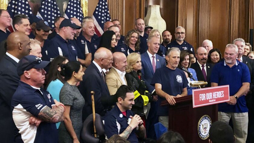 Entertainer Jon Stewart speaks at a news conference on behalf of 9/11 victims and families at the Capitol on Friday.