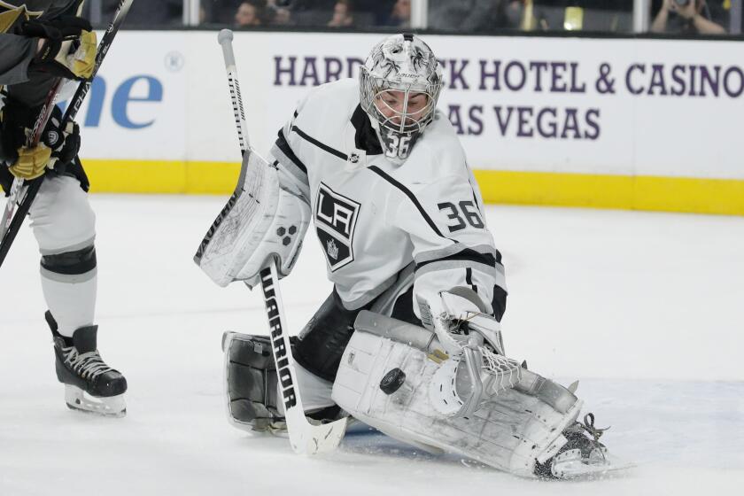 Los Angeles Kings goaltender Jack Campbell (36) blocks a shot by the Vegas Golden Knights during the second period of an NHL hockey game Thursday, Jan. 9, 2020, in Las Vegas. (AP Photo/John Locher)
