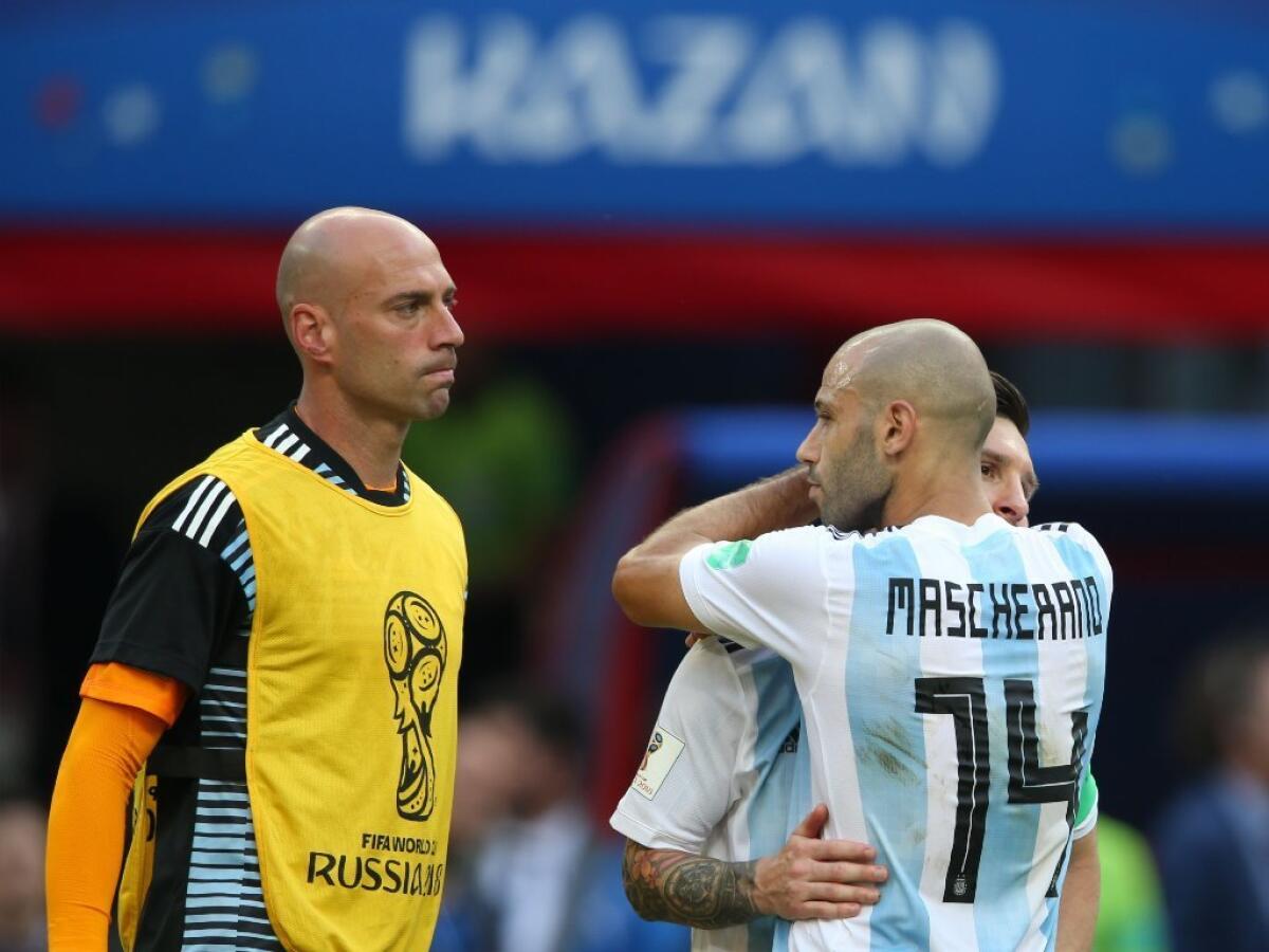 Argentina midfielder Javier Mascherano and forward Lionel Messi, right, react after losing a round of 16 match against France on June 30.