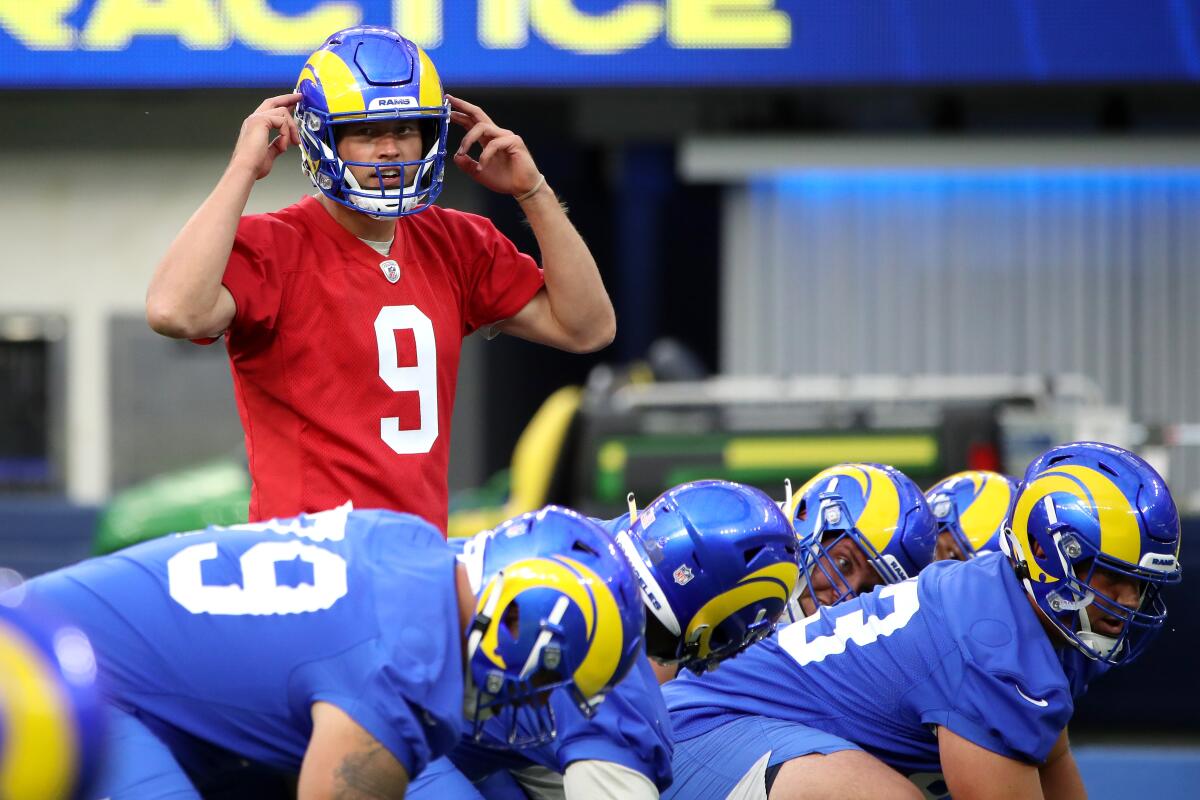 Rams quarterback Matthew Stafford calls signals during practice.