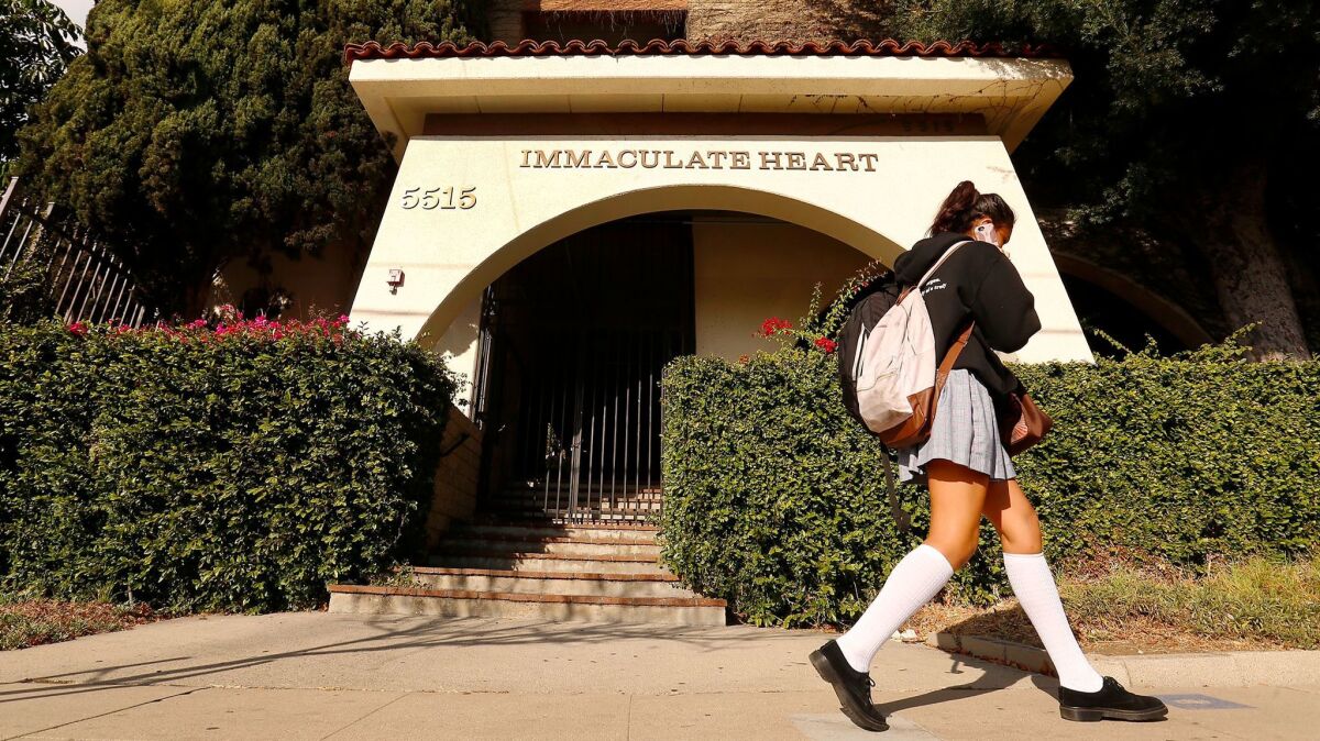 Students depart the campus at Immaculate Heart High School in the Hollywood Hills.