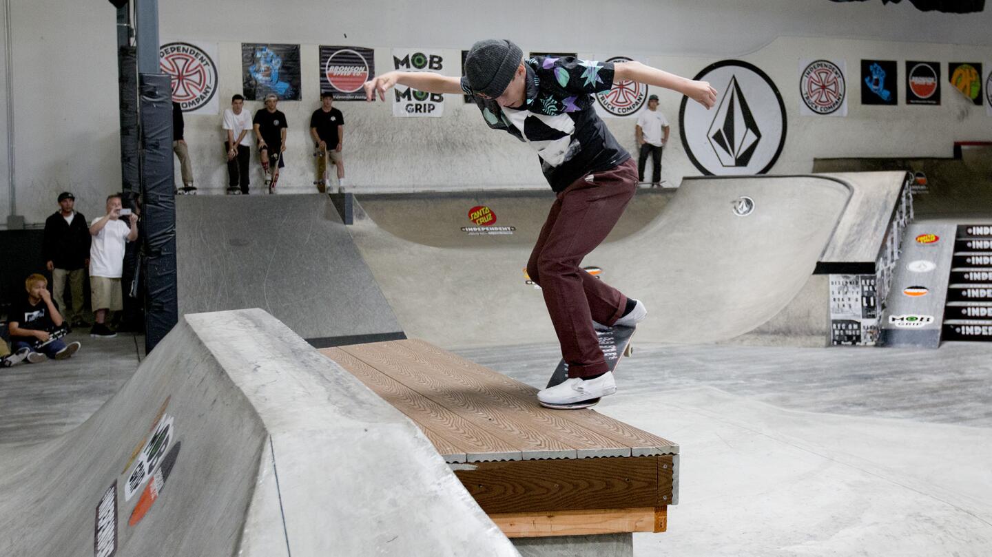 CJ Collins of Anaheim, Calif., pulls a nose grind during Damn Am Costa Mesa, an amateur skateboarding tournament with participants vying to qualify for the Tampa Am, at Volcom headquarters on Saturday. (Kevin Chang/ Daily Pilot)