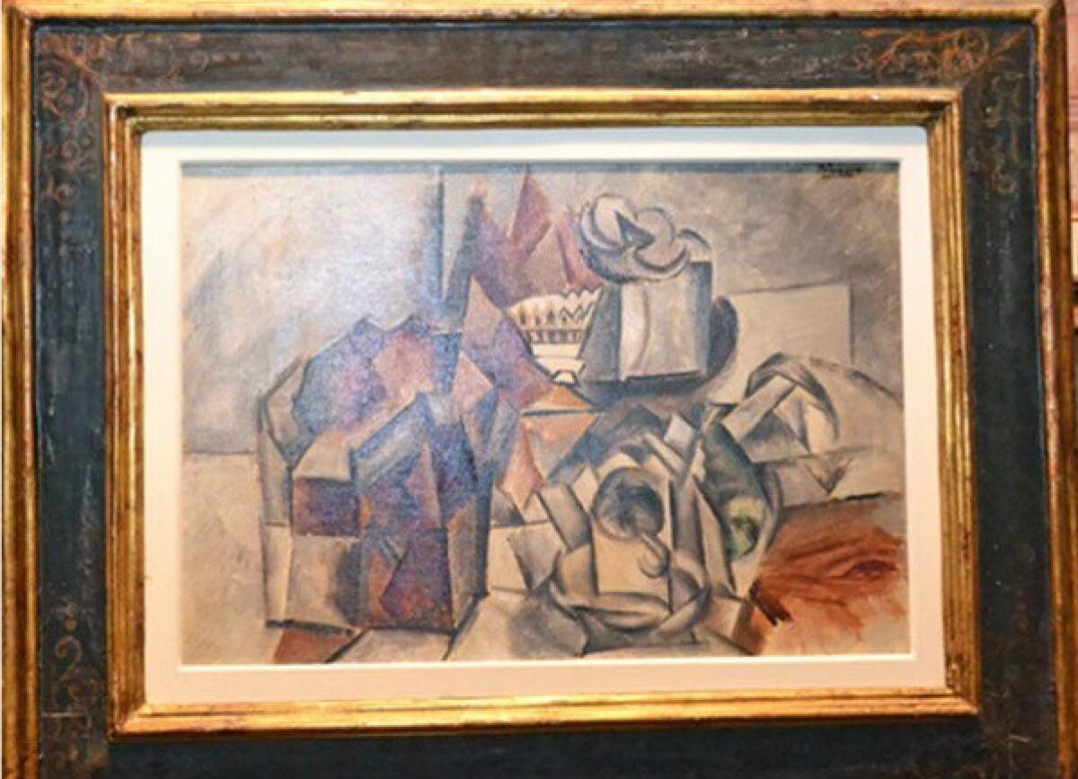 Pablo Picasso's 1909 painting "Compotier et tasse" ("Fruit bowl and cup").
