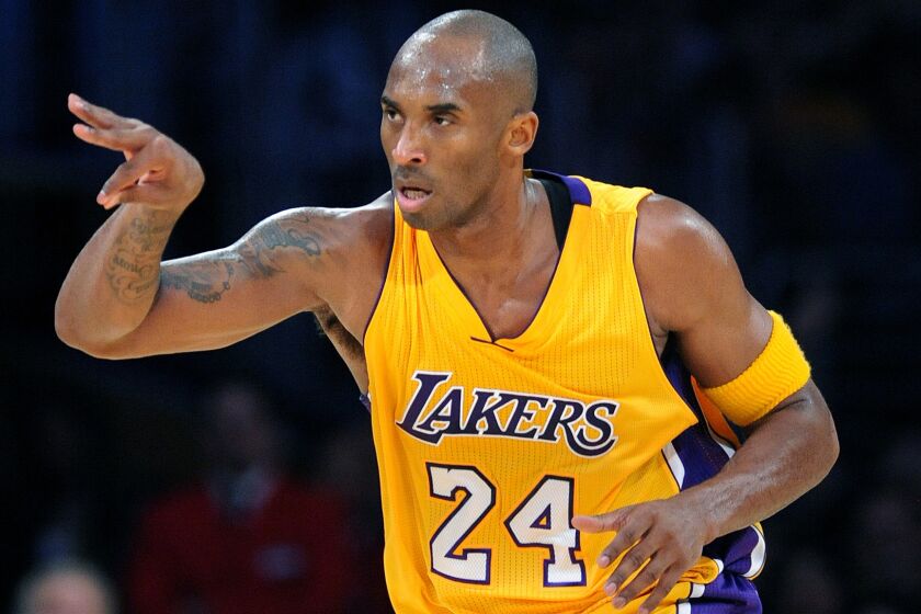 Lakers guard Kobe Bryant, celebrating a three-pointer, is No. 3 on the NBA's all-time scoring list.