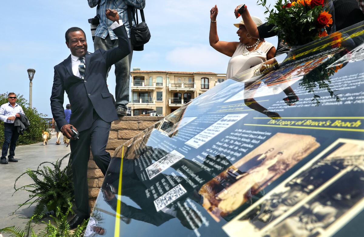 Mitch Ward, former mayor of Manhattan Beach, visits a mock-up of the historical plaque for Bruce's Beach on July 20. 