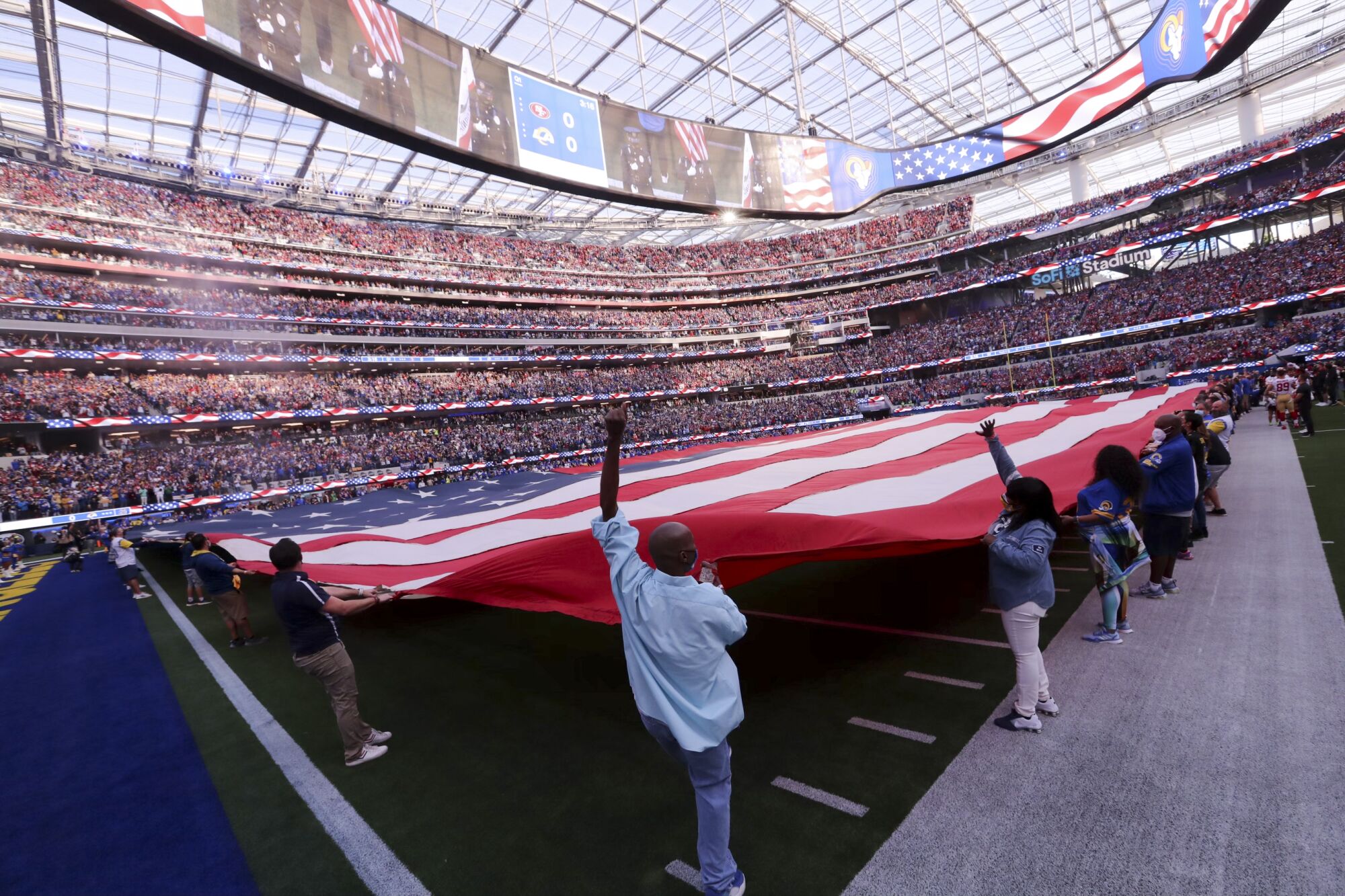 The American flag is adorned on the field before the game between the Los Angeles Rams and San Francisco 49ers.