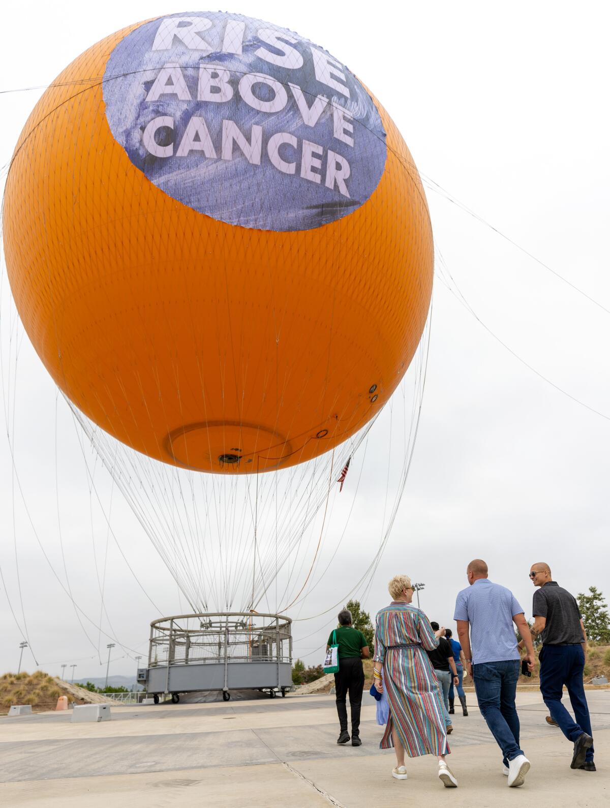 City of Hope Orange County cancer survivors prepare to ride in the Great Park Balloon at Great Park in Irvine.