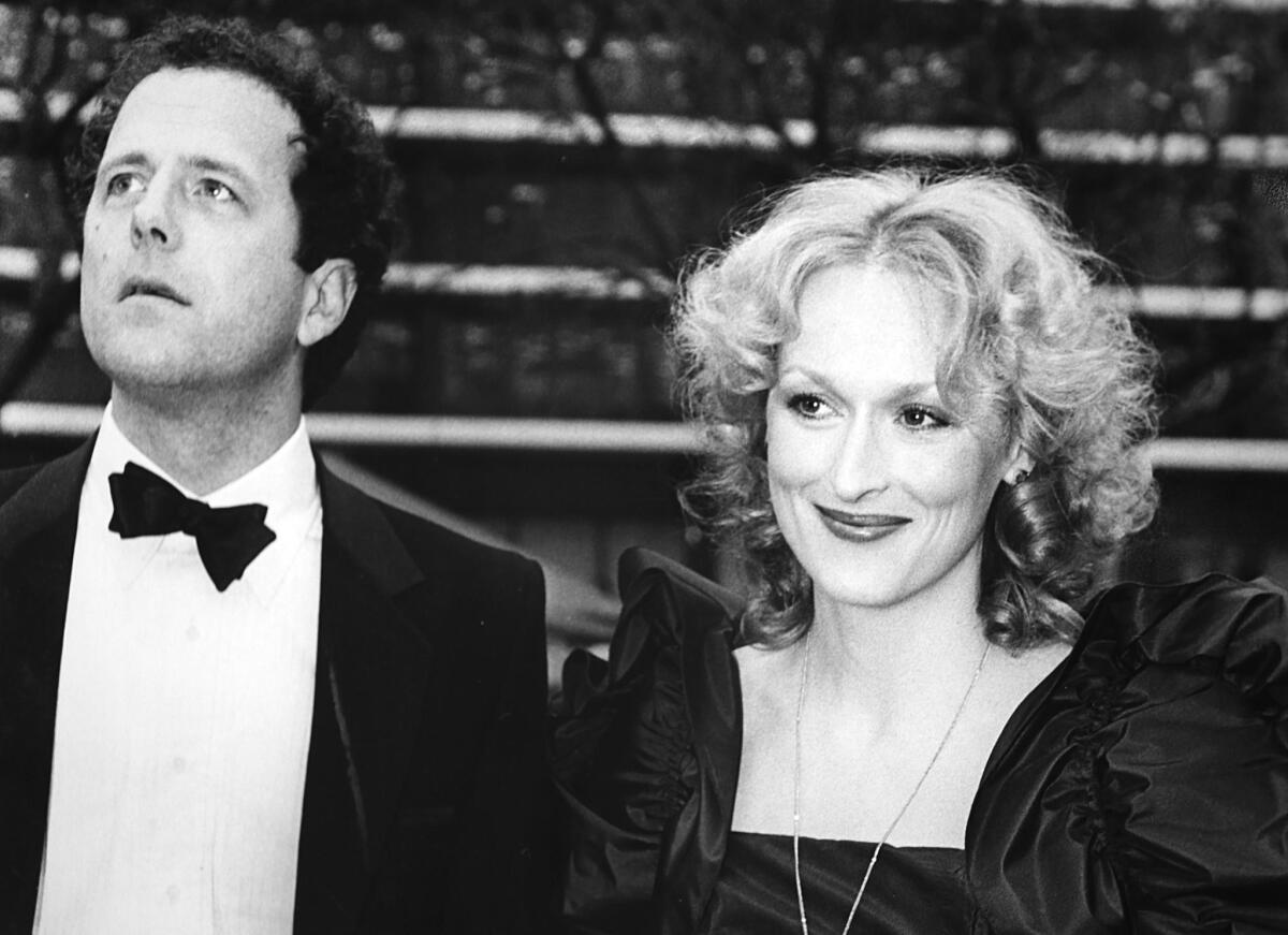 Streep with her husband, Don Gummer, at the 1982 Academy Awards ceremony.