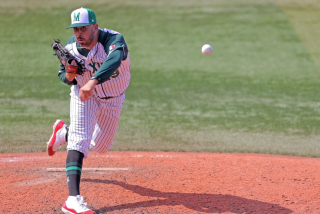 Mexico's relief pitcher Oliver Perez hurls the ball during the eighth inning.