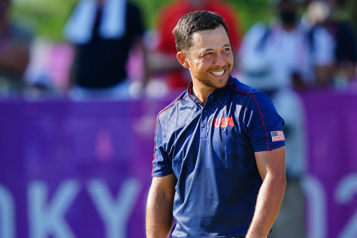 U.S. golfer Xander Schauffele celebrates after winning the gold medal.