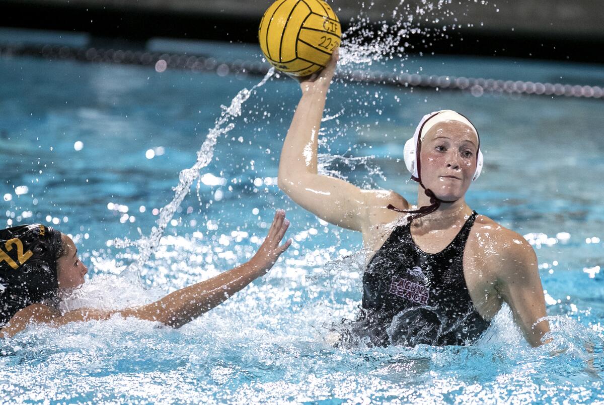 Laguna Beach's Ava Knepper takes a shot against Foothill's Gabrielle Graniello during Wednesday's match.