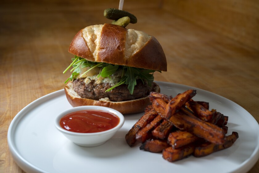 New York steak grounded into a burger and mixed bacon, caramelized onions and fresh parsley.