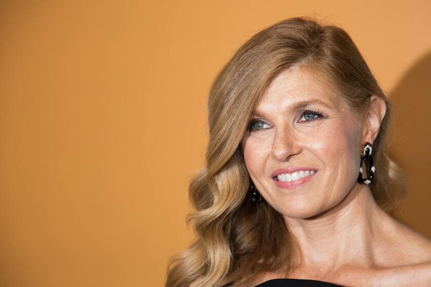 Connie Britton says the death of her parents a few years ago caused her to reexamine her life and make changes, including adopting a child.