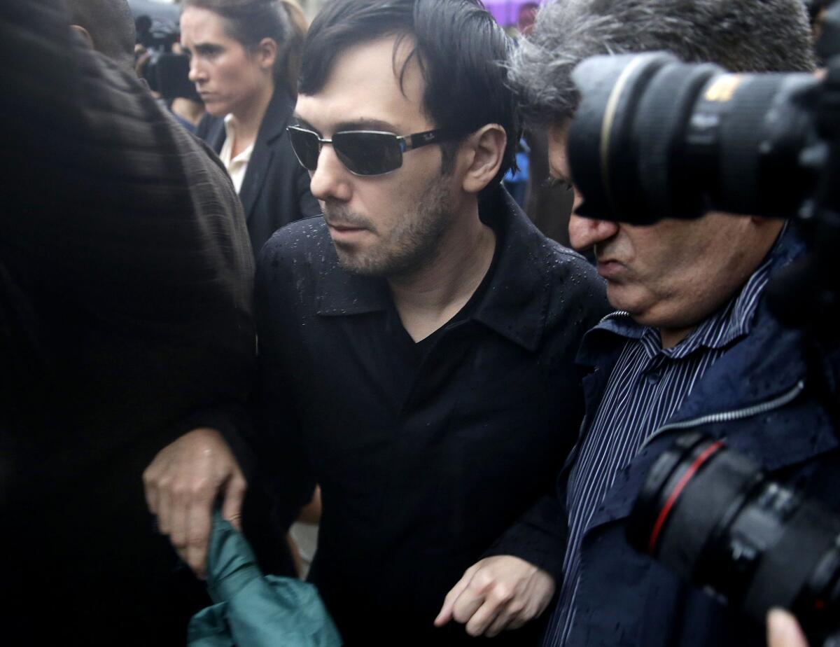 Martin Shkreli leaves a New York courthouse on Dec. 17 after his arraignment on charges of securities fraud.