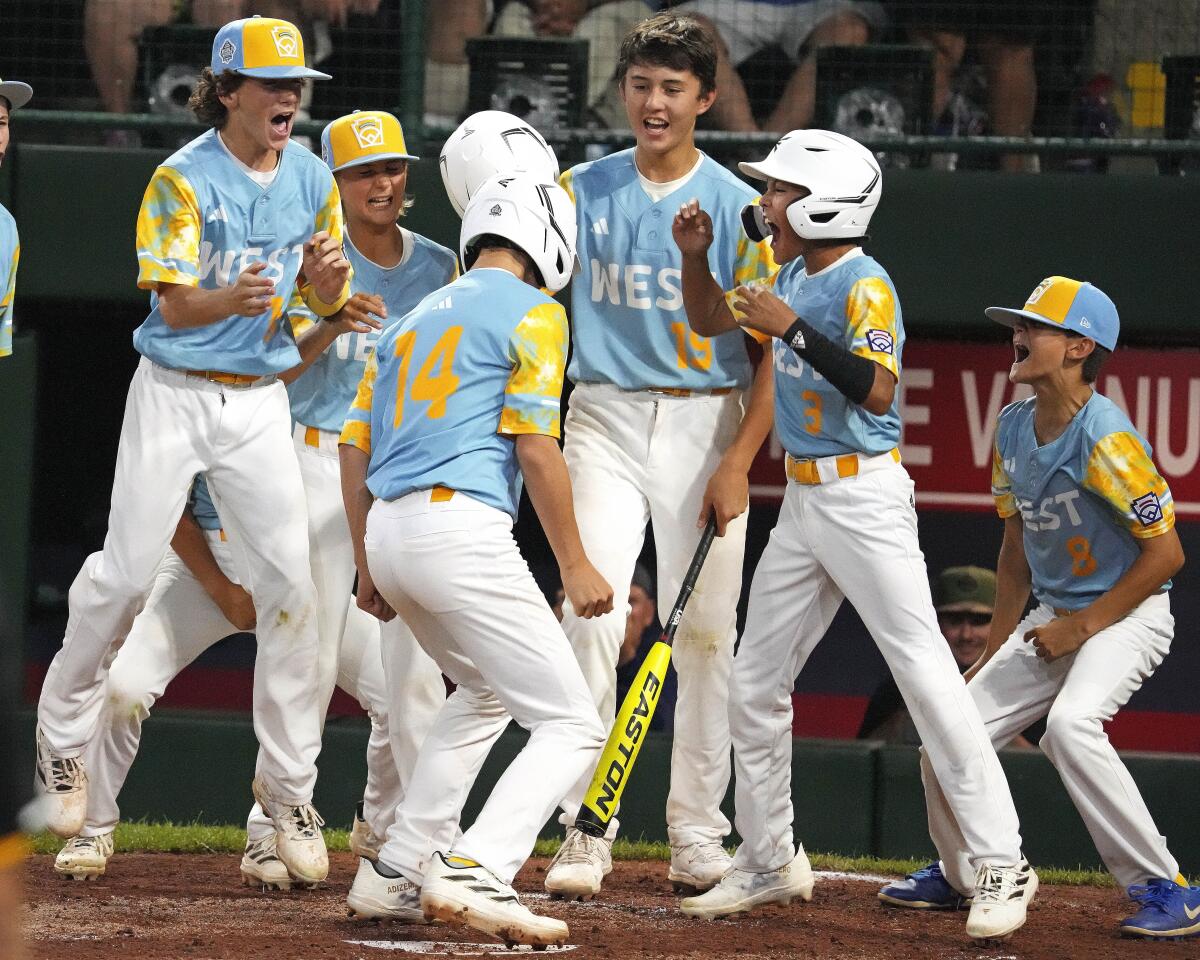 El Segundo's Brody Brooks crosses home plate after hitting a two-run home run.