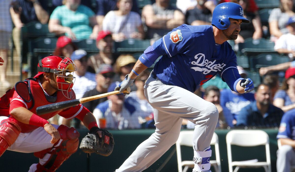 Los Angeles Dodgers' Adrian Gonzalez hits against the Los Angeles Angels during a spring training baseball game on March 9 in Tempe, Ariz.
