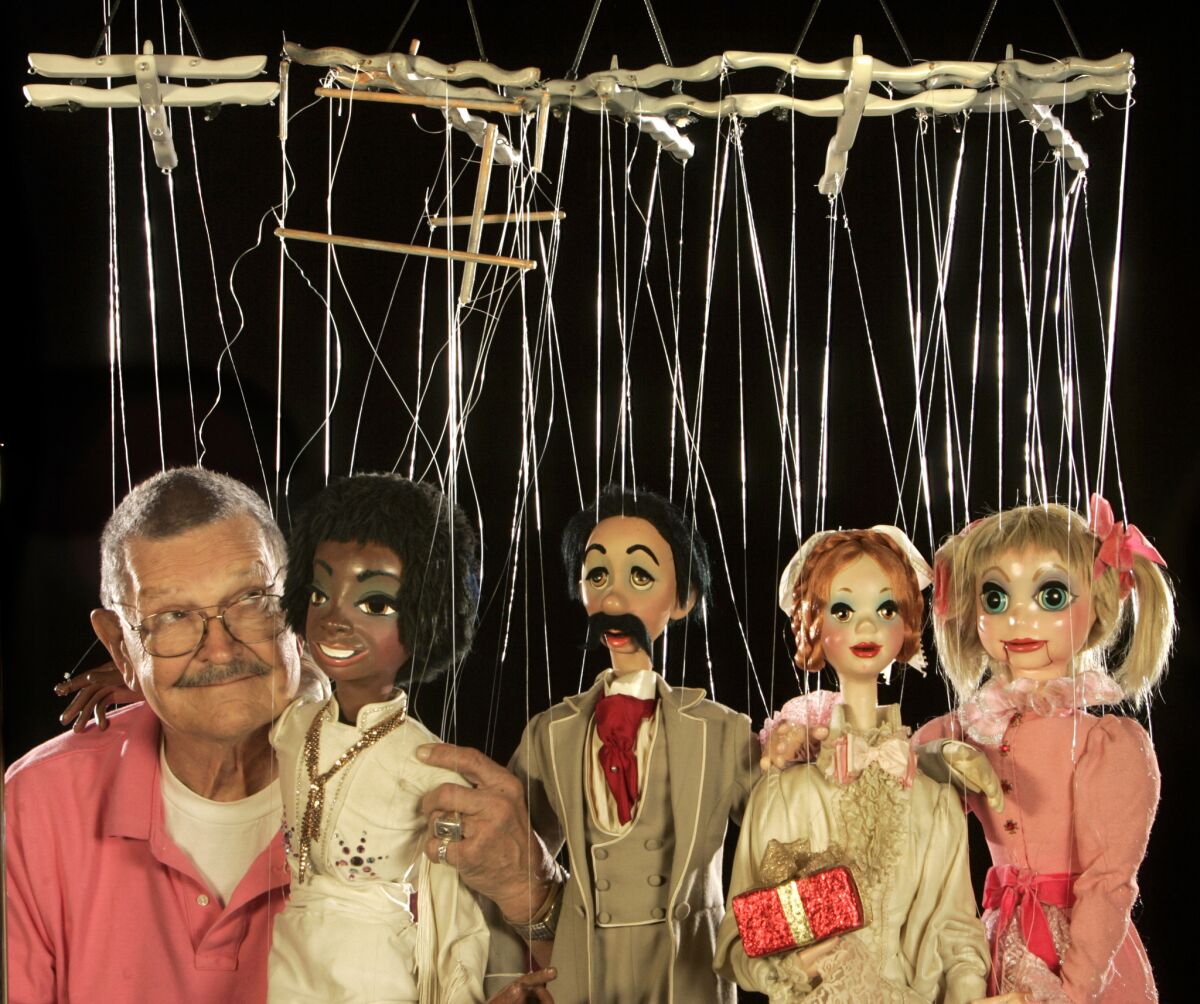 The late Bob Baker, owner and creator of the Bob Baker Marionette Theatre in Los Angeles, with some of his marionettes on in 2008. Baker died Nov. 28, 2014, at 90.