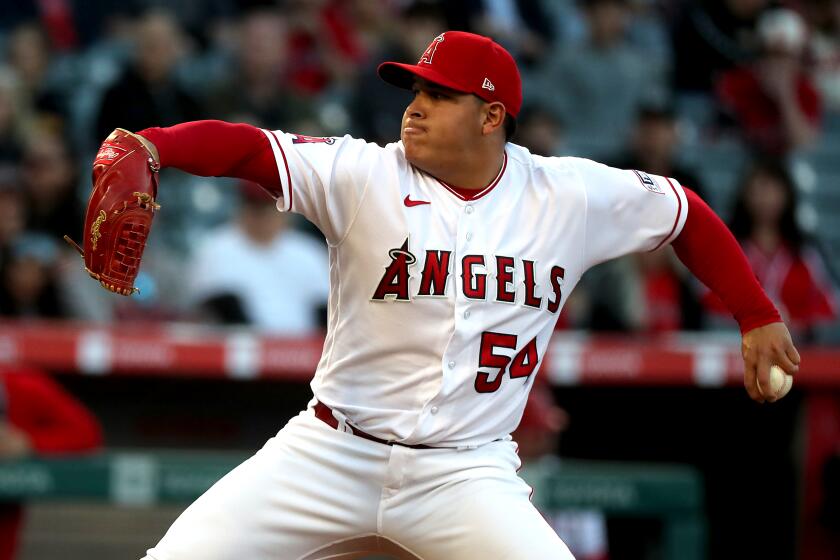 Anaheim, CA - April 10: Angels starter Jose Suarez delivers a pitch against the Nationals.