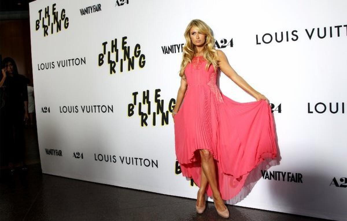 Paris Hilton arrives at the L.A. premiere of "The Bling Ring" at the Directors Guild of America.