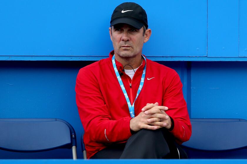 EASTBOURNE, ENGLAND - JUNE 18: Paul Annacone watches Sloane Stephens of the United States play Caroline Wozniacki of Denmark during the Aegon International at Devonshire Park on June 18, 2014 in Eastbourne, England. (Photo by Matthew Stockman/Getty Images)