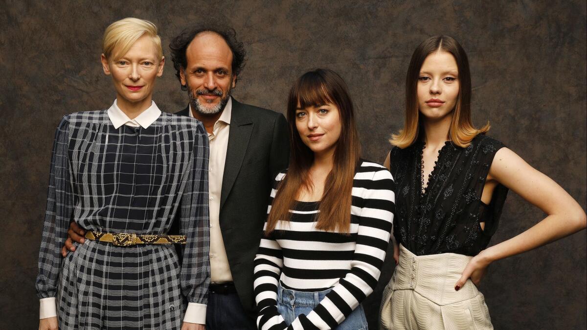 Director Luca Guadagnino and actors Tilda Swinton, left, Dakota Johnson and Mia Goth worked together on the stylish horror film "Suspiria."