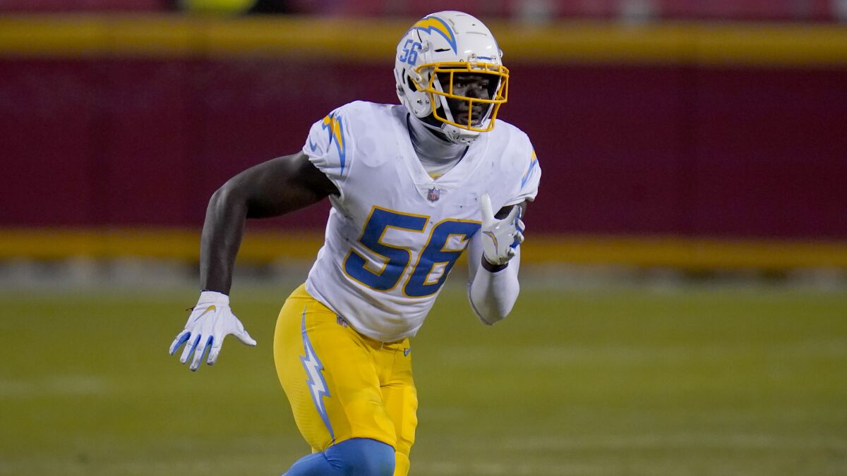 Chargers linebacker Kenneth Murray Jr. runs during a game.