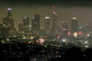 LOS ANGELES, CALIF. - JULY 4, 2022. Illegal fireworks explode over downtown Los Angeles on the Fourth of July. (Luis Sinco / os Angeles Times)