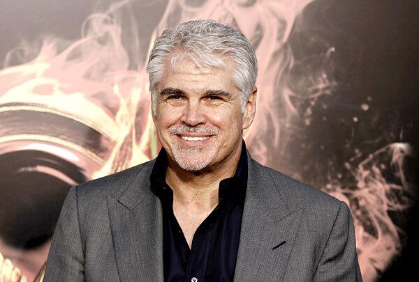 Director Gary Ross smiles at the premiere of his latest film.