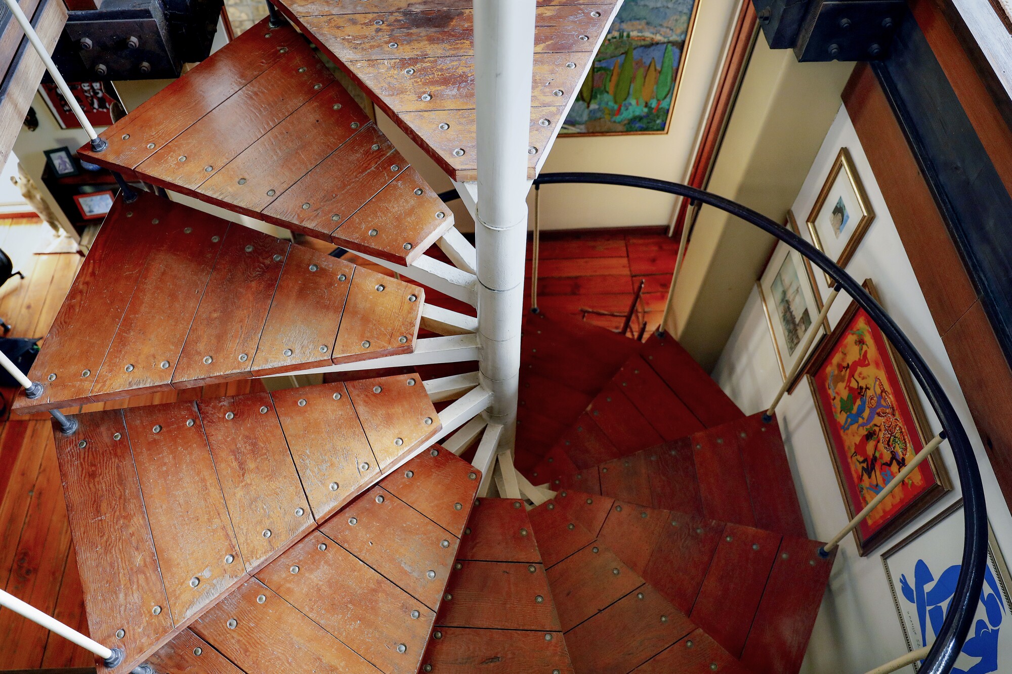 The wooden spiral staircase of Bernard Judge's treehouse seen from above
