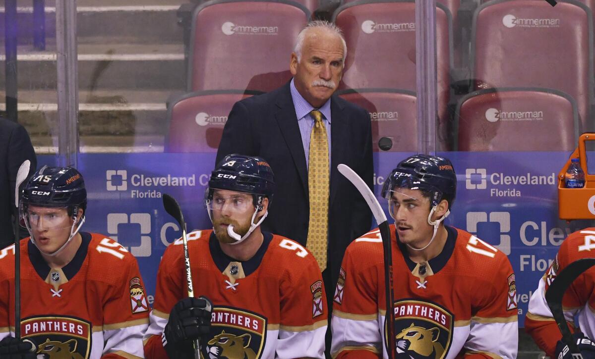 Florida Panthers head coach Joel Quenneville looks on from the bench during a game against the Colorado Avalanche.