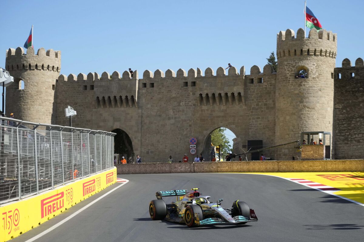 Mercedes driver Lewis Hamilton of Britain steers his car during the first free practice at the Baku circuit, in Baku, Azerbaijan, Friday, June 10, 2022. The Formula One Grand Prix will be held on Sunday. (AP Photo/Sergei Grits)