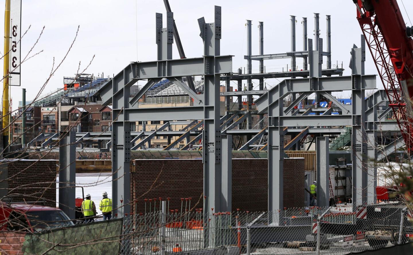 Wrigley Field's right-field bleachers are not expected to be ready until mid-June.