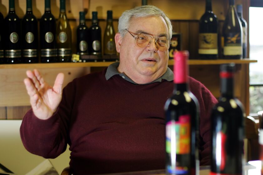 Fred Franzia, CEO of Bronco Wine Co., gestures during an interview in his combination conference and tasting room at the winery's headquarters in Ceres, Calif., Jan. 11, 2005. Central California vintner Fred Franzia, who has been fighting a state law requiring that wines with "Napa" on the label be made from grapes grown in that exclusive region, is releasing two new wines under his Napa Creek label, both going for $3.99 a bottle. The twist: This time the wines are actually made with grapes from Napa.(AP Photo/Eric Risberg) ORG XMIT: NY847