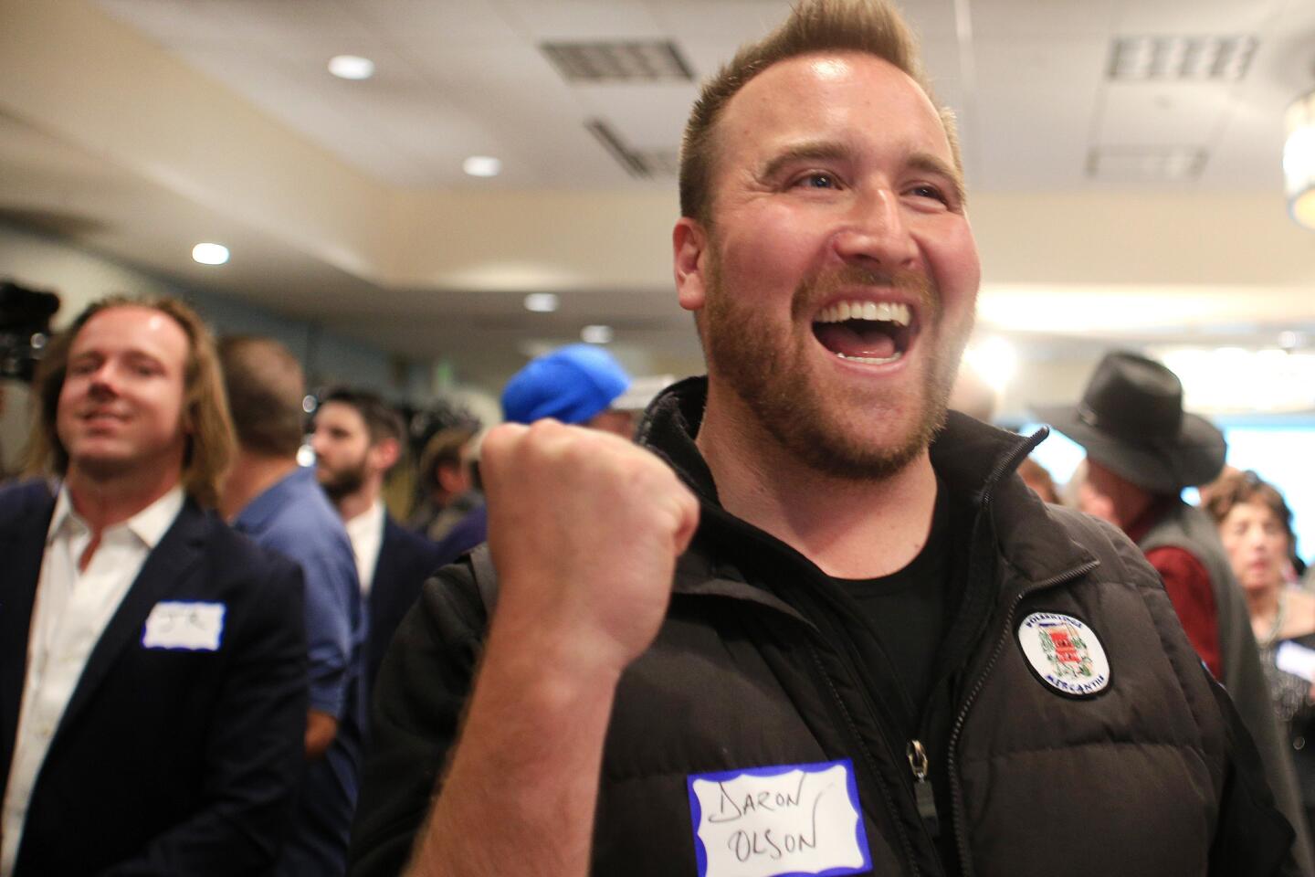 Daron Olson reacts as Republican Greg Gianforte's election lead is announced in Bozeman, Mont.