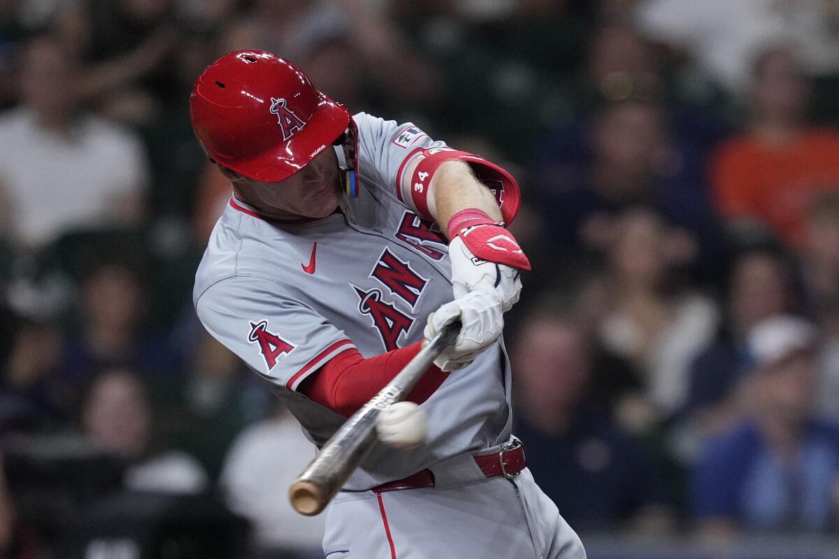 Los Angeles Angels' Eric Wagaman hits an RBI double during the fifth inning of a baseball game.