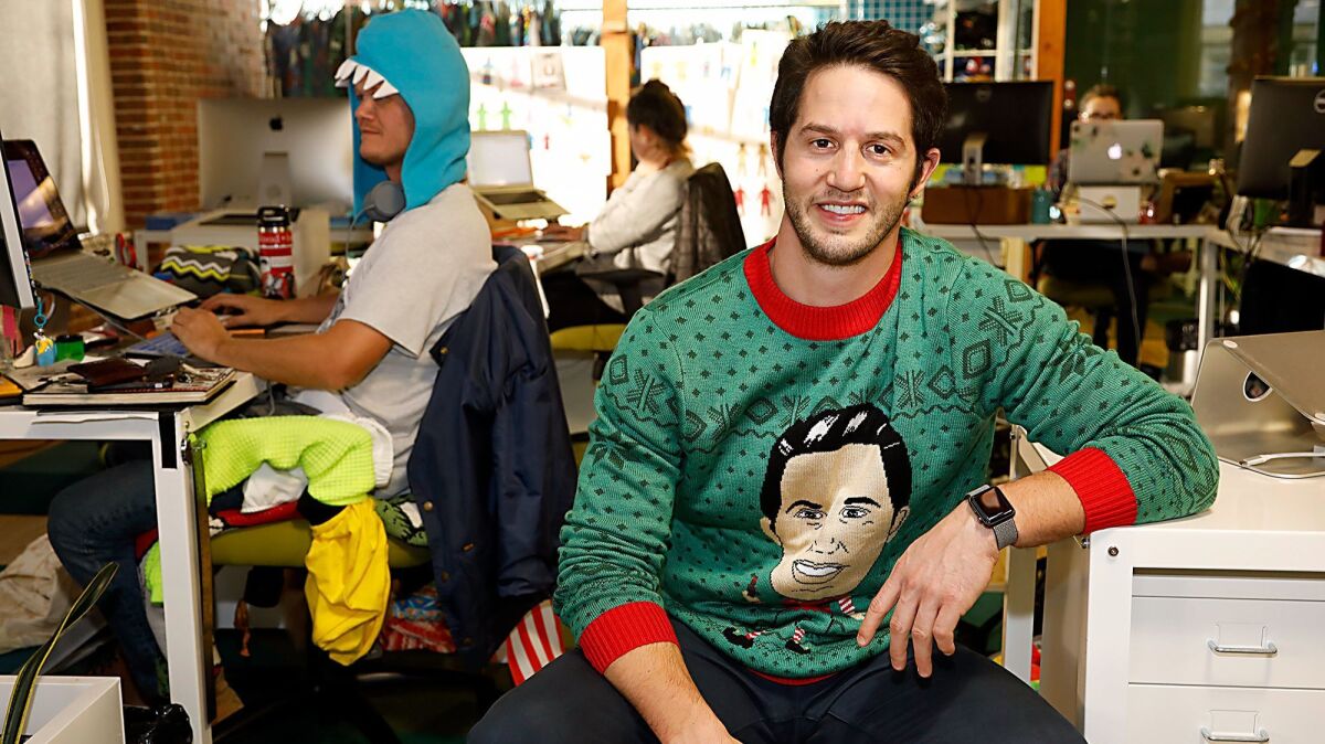 Evan Mendelsohn, wearing his own likeness on a sweater, is the co-founder of Tipsy Elves. Started in 2011, Tipsy Elves has grown its e-commerce ugly sweater business into year-round irreverent clothing company that has done more than $50 million in total sales.