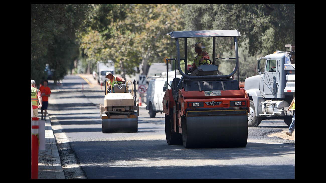 Photo Gallery: Paradise Canyon Elementary streets get new asphalt for new school year