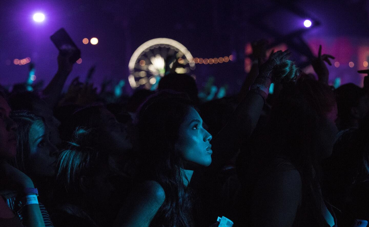 Fans wait for Travis Scott to take the stage at the Coachella Valley Music and Arts Festival, 2017.