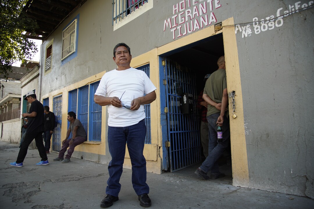 Jose Maria Garcia Lara stands in front of a migrant shelter