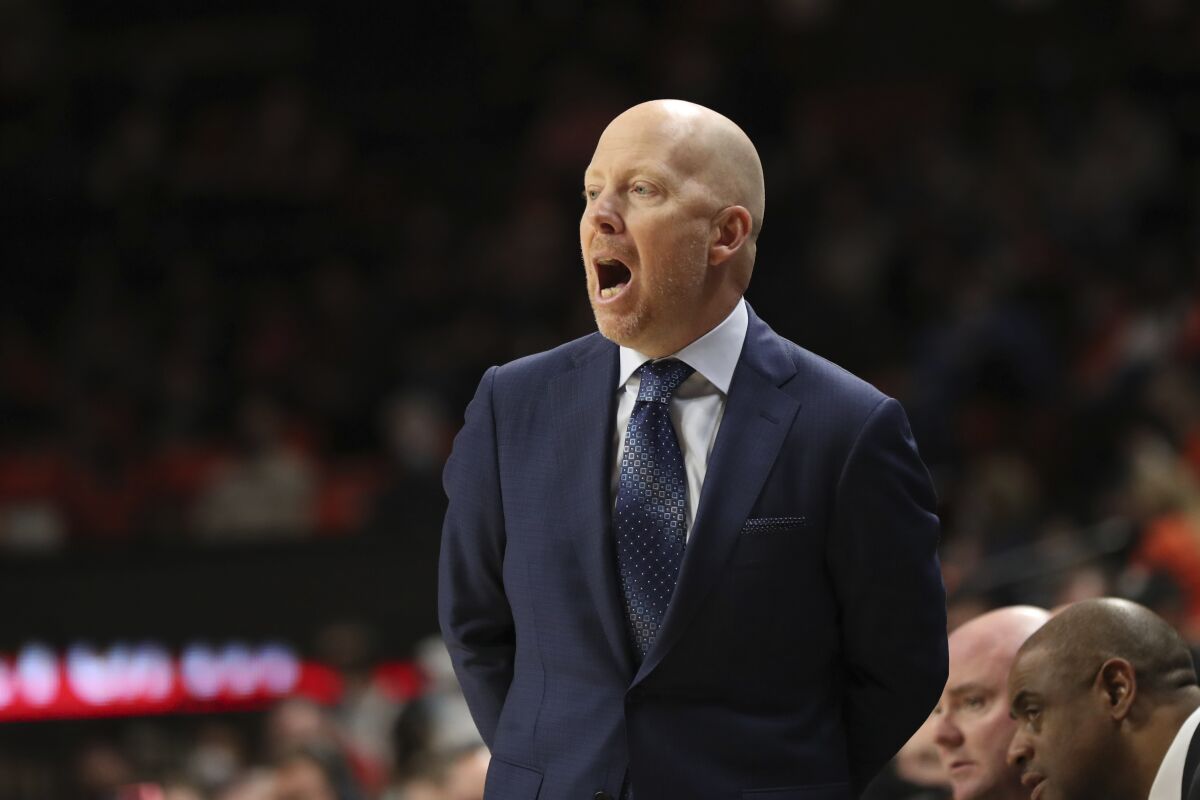 UCLA head coach Mike Cronin calls out to players.