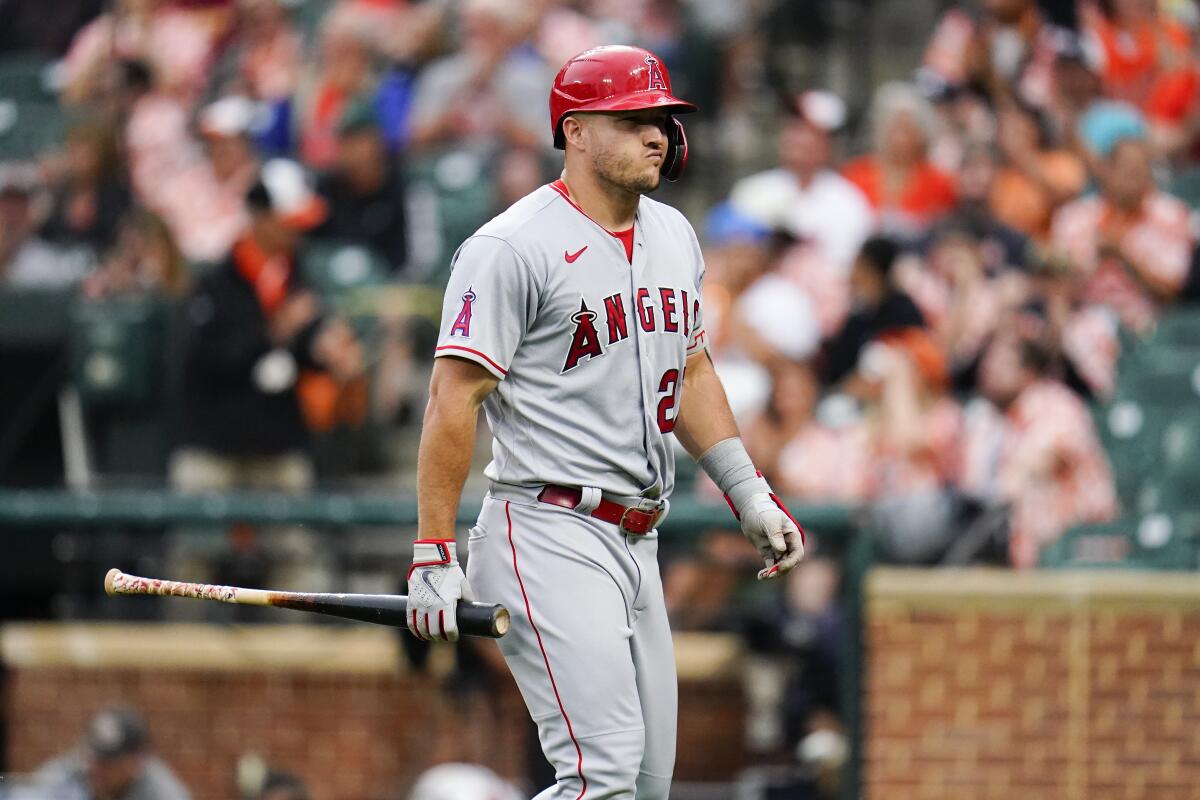 Angels' Mike Trout heads to the dugout after striking out against the Baltimore Orioles.