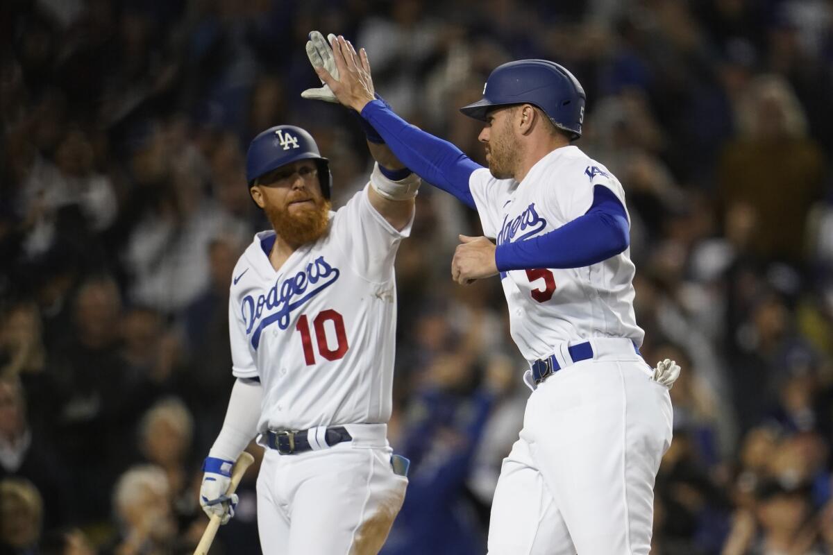 Fans welcome Freeman in Dodgers' 9-3 win over Reds - The San Diego  Union-Tribune