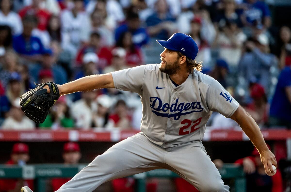 The Dodgers' Clayton Kershaw pitches against the Angels.