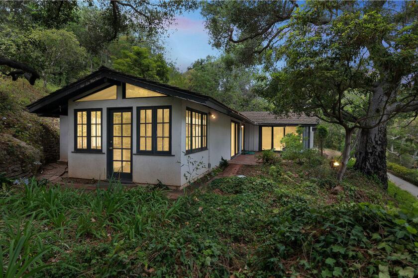 Built in 1955 and never renovated, the single-story home is tucked into a leafy lot near Sullivan Canyon Park.