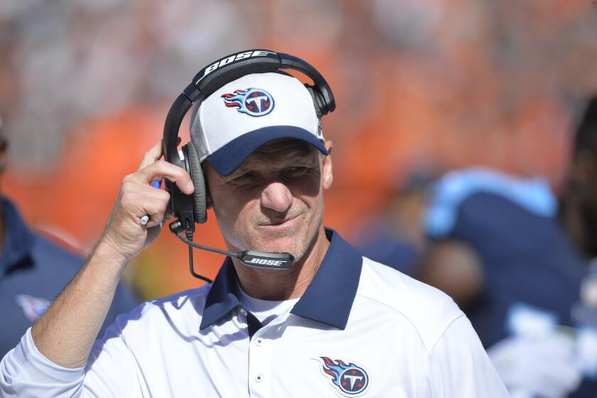 Ken Whisenhunt coaches the Tennessee Titans against the Browns in Cleveland on Sept. 20.