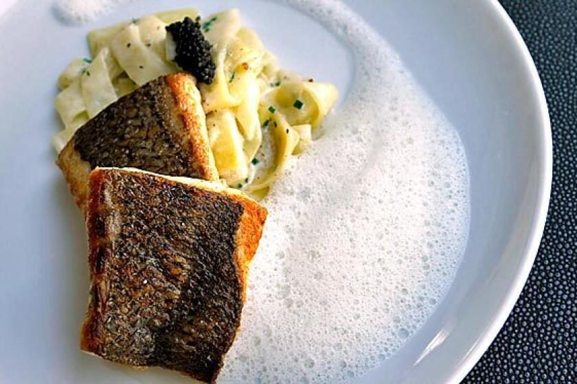 A striped bass dish with caviar.