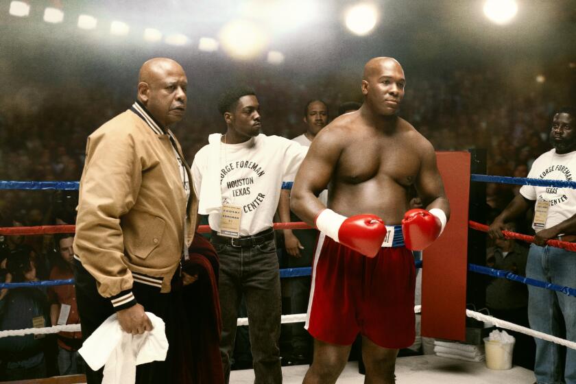 Forest Whitaker, left, and Khris Davis, right, in the movie "Big George Foreman."