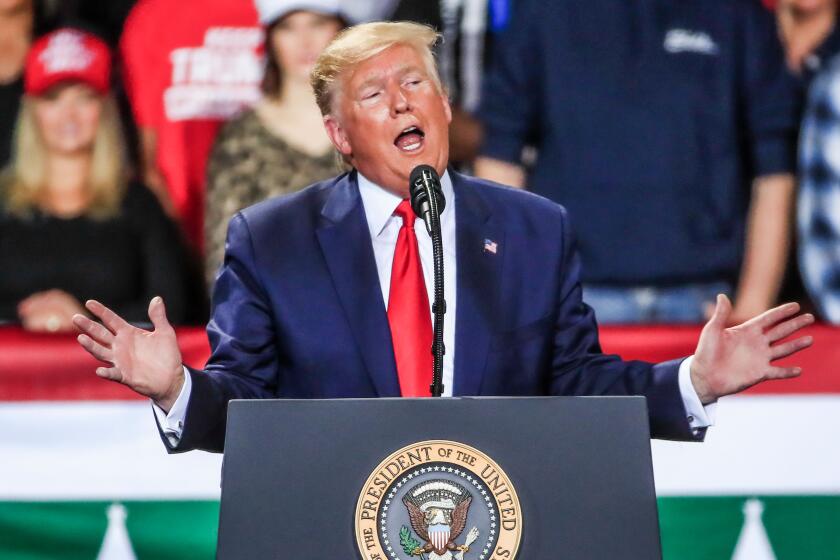 Mandatory Credit: Photo by TANNEN MAURY/EPA-EFE/REX (10509258k) US President Donald J. Trump addresses supporters during his Christmas Rally at the Kellogg Arena in Battle Creek, Michigan, USA, 18 December 2019. The majority of the House voted on 18 December to impeach Trump with abuse of power and obstruction of Congress. Trump is the third US president to be impeached. US President Trump Christmas rally in Battle Creek, USA - 18 Dec 2019 ** Usable by LA, CT and MoD ONLY **