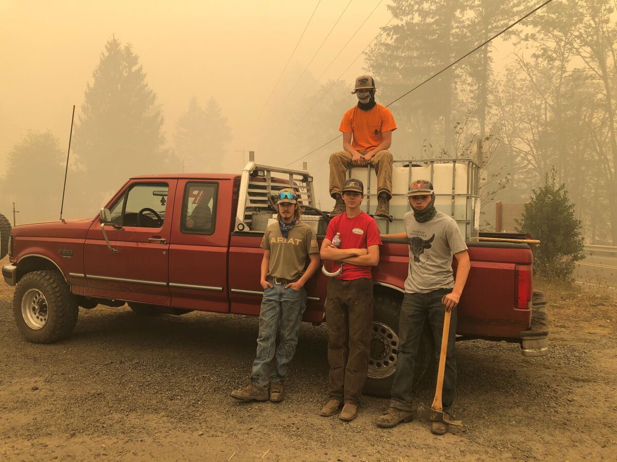  Jon Pennick, 16, joins some friends to fight fires in Gates, east of Salem, Ore.