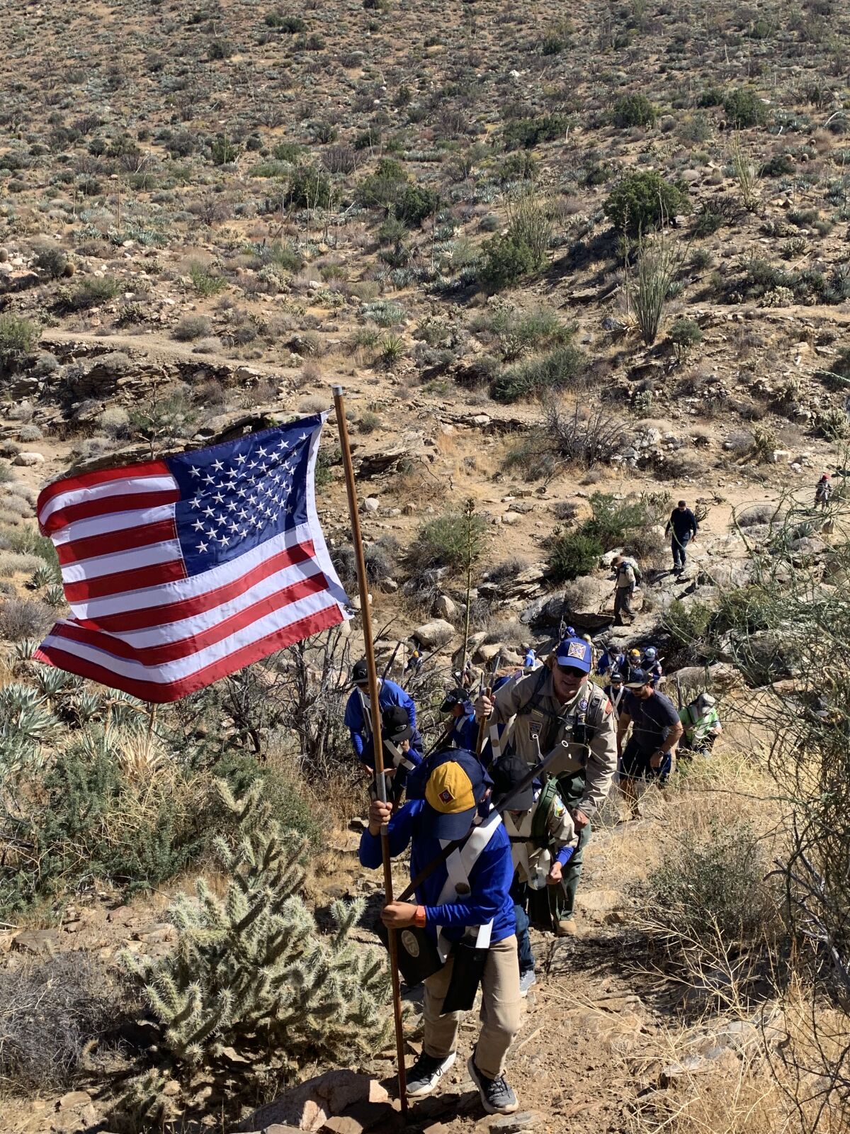 Cub Scouts climb uphill to a memorial site in Box Canyon on the Great Southern Overland Route of 1849 near Julian on Saturday, Oct. 19, during a five-mile hike re-creating a portion of the Mormon Battalion's march in the mid-1840s.